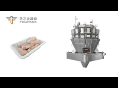 Całkowicie zautomatyzowana linia pakowania skrzydeł mrożonego kurczaka, dokładnie ważona przez skrzypę TOUPACK multihea